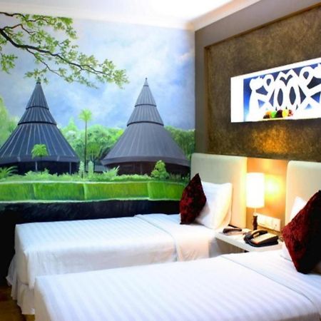 Amos Cozy Hotel Melawai Jakarta Exterior photo